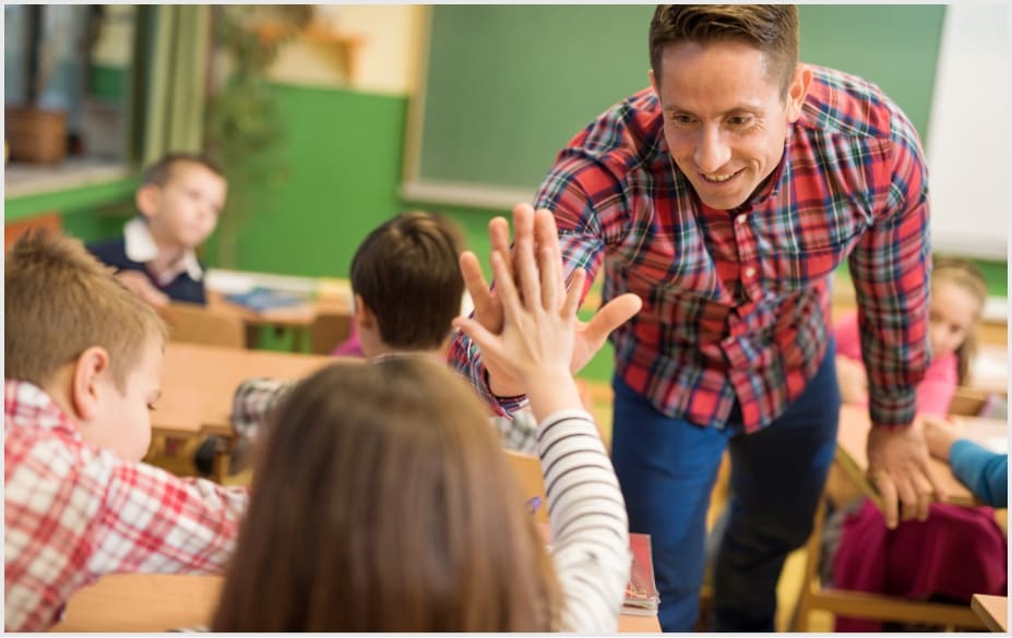 Teacher giving student a high-five